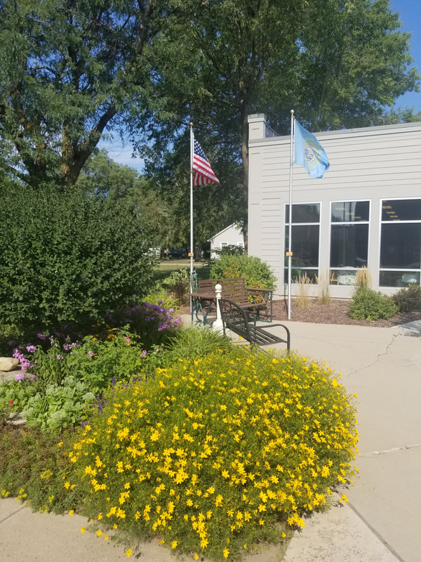 Local community member grow and maintain flower gardens